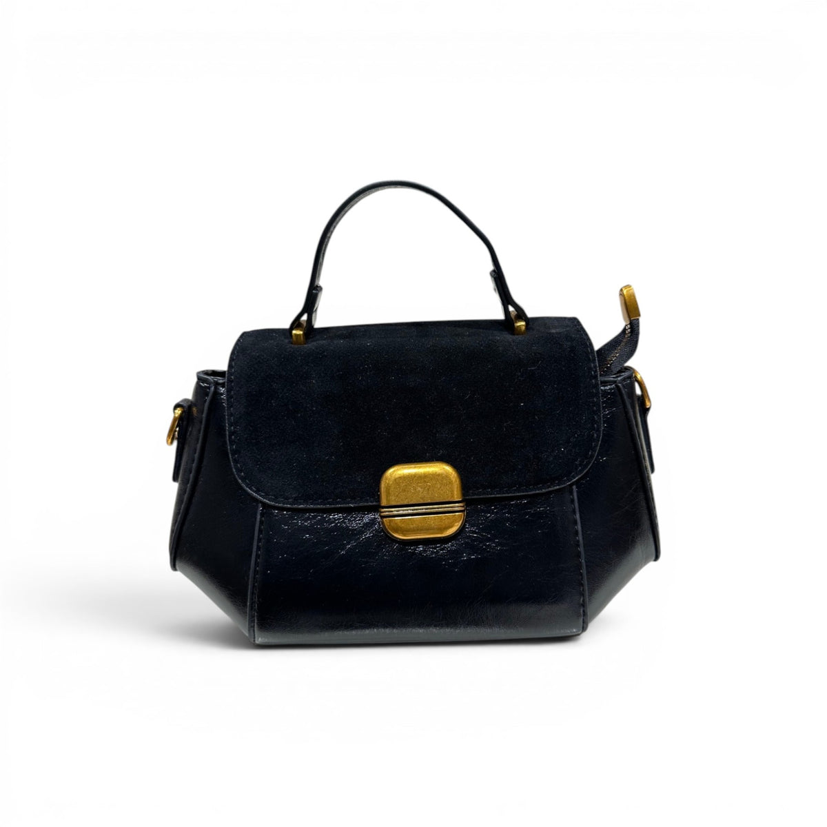 COC Store black faux leather and suede satchel bag with gold-tone clasp closure and top handle.