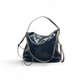 COC Store glossy faux leather shoulder bag in rich brown with tan straps, silver chain detail and adjustable strap.