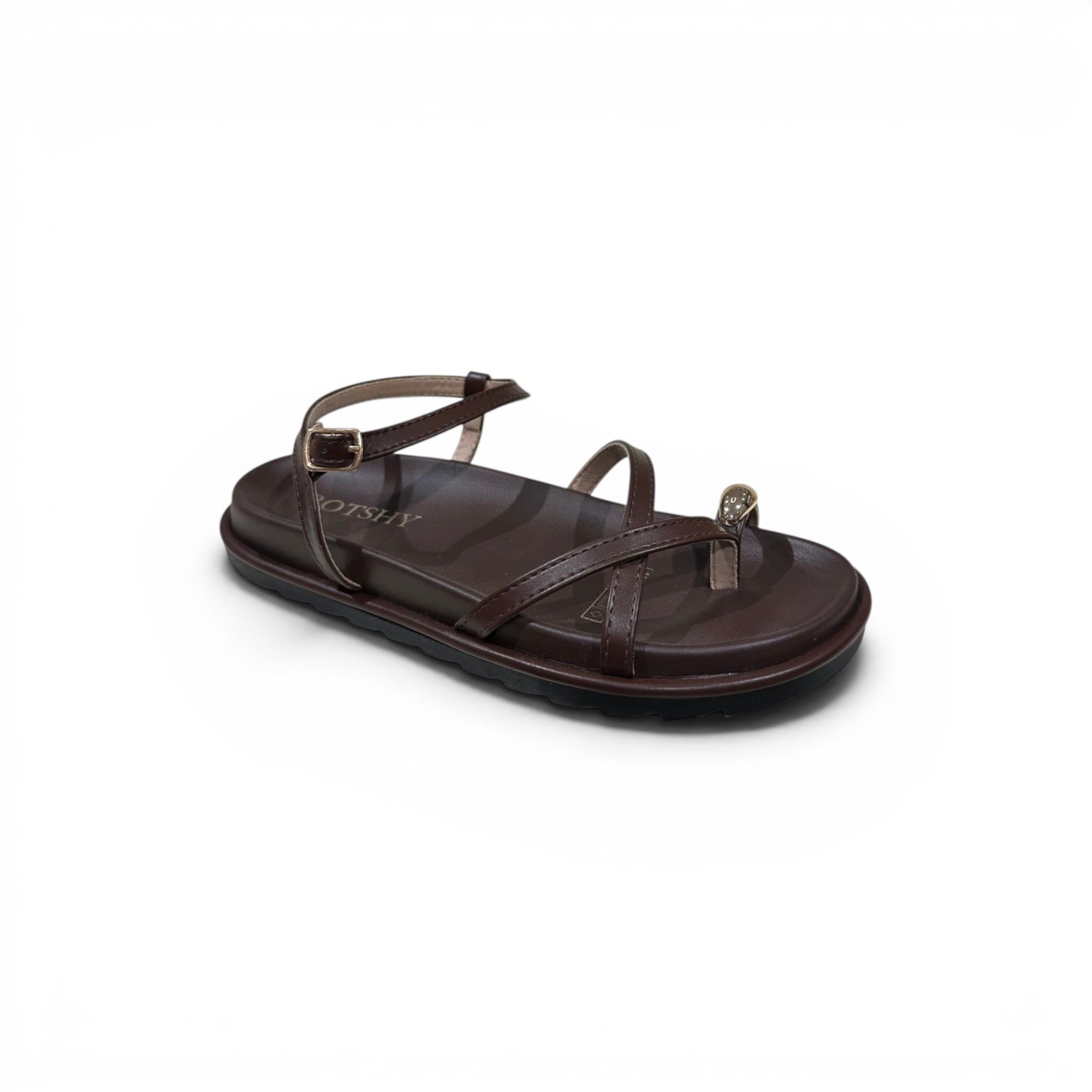 COC Store brown strappy flat sandals with toe ring and ankle buckle.