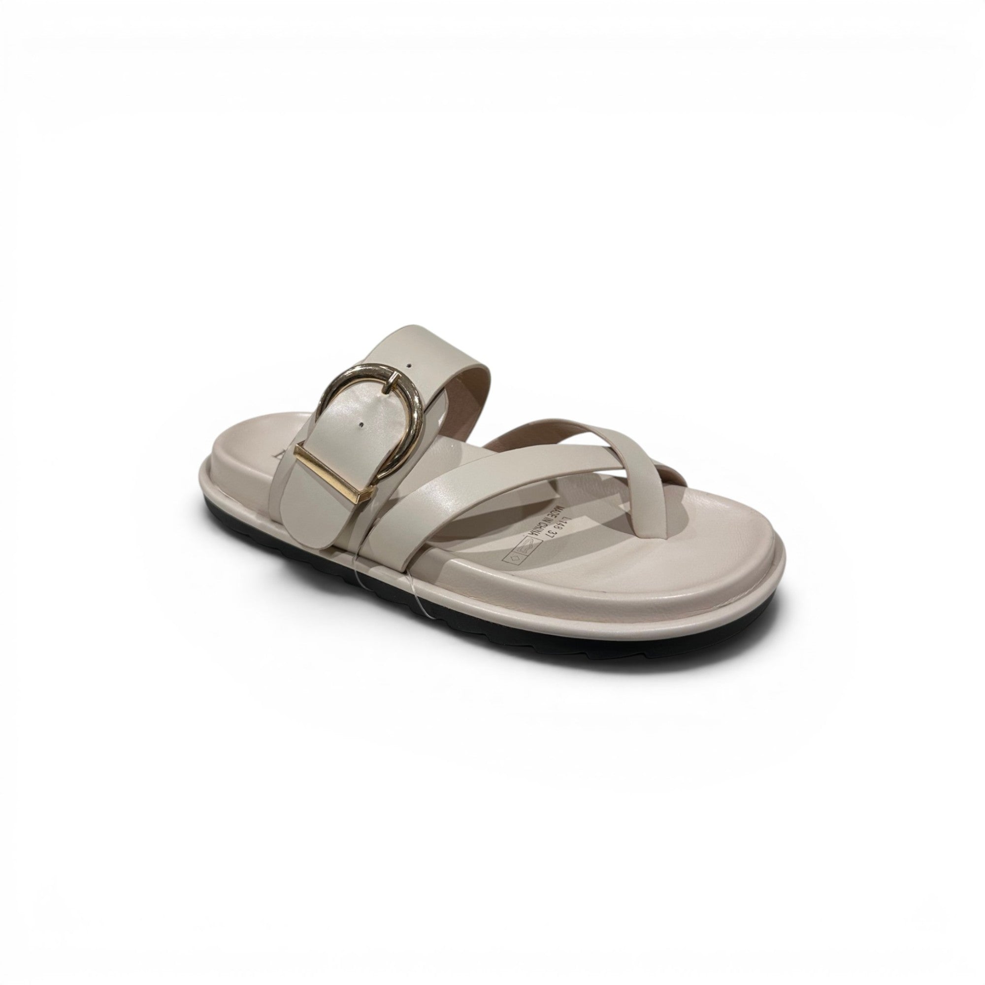 COC Store cream leather slide sandals with gold buckle and crisscross toe strap.