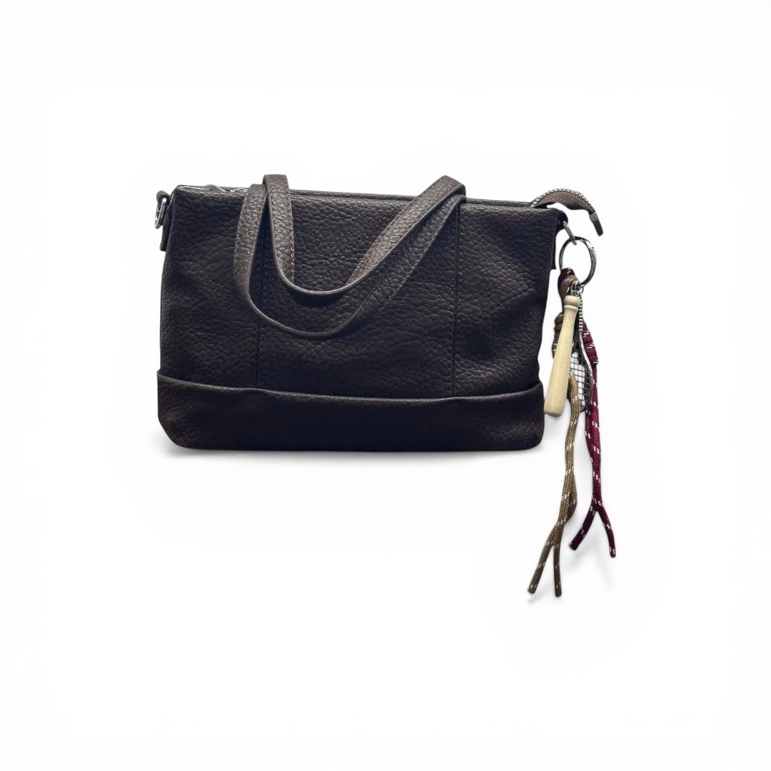 COC Store dark brown textured leather tote bag with zip top and keychain detail.
