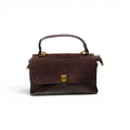 COC Store structured top handle bag in espresso faux leather with gold-tone clasp closure.