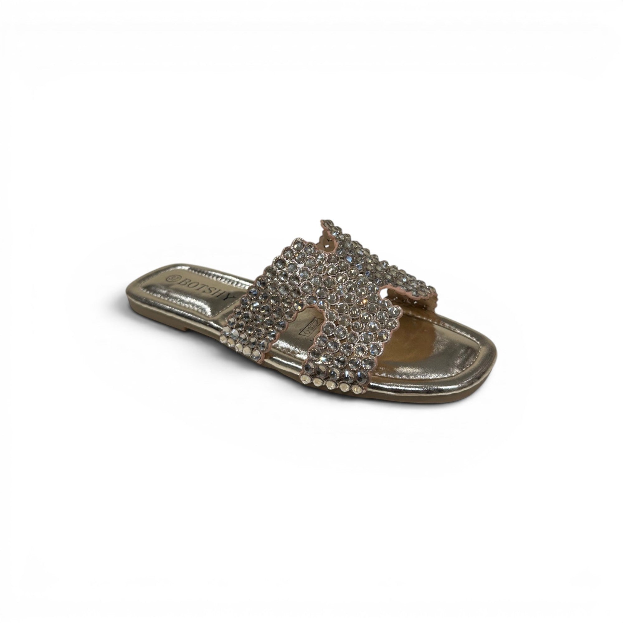 COC Store gold embellished slide sandals with H-shaped strap and rhinestones.