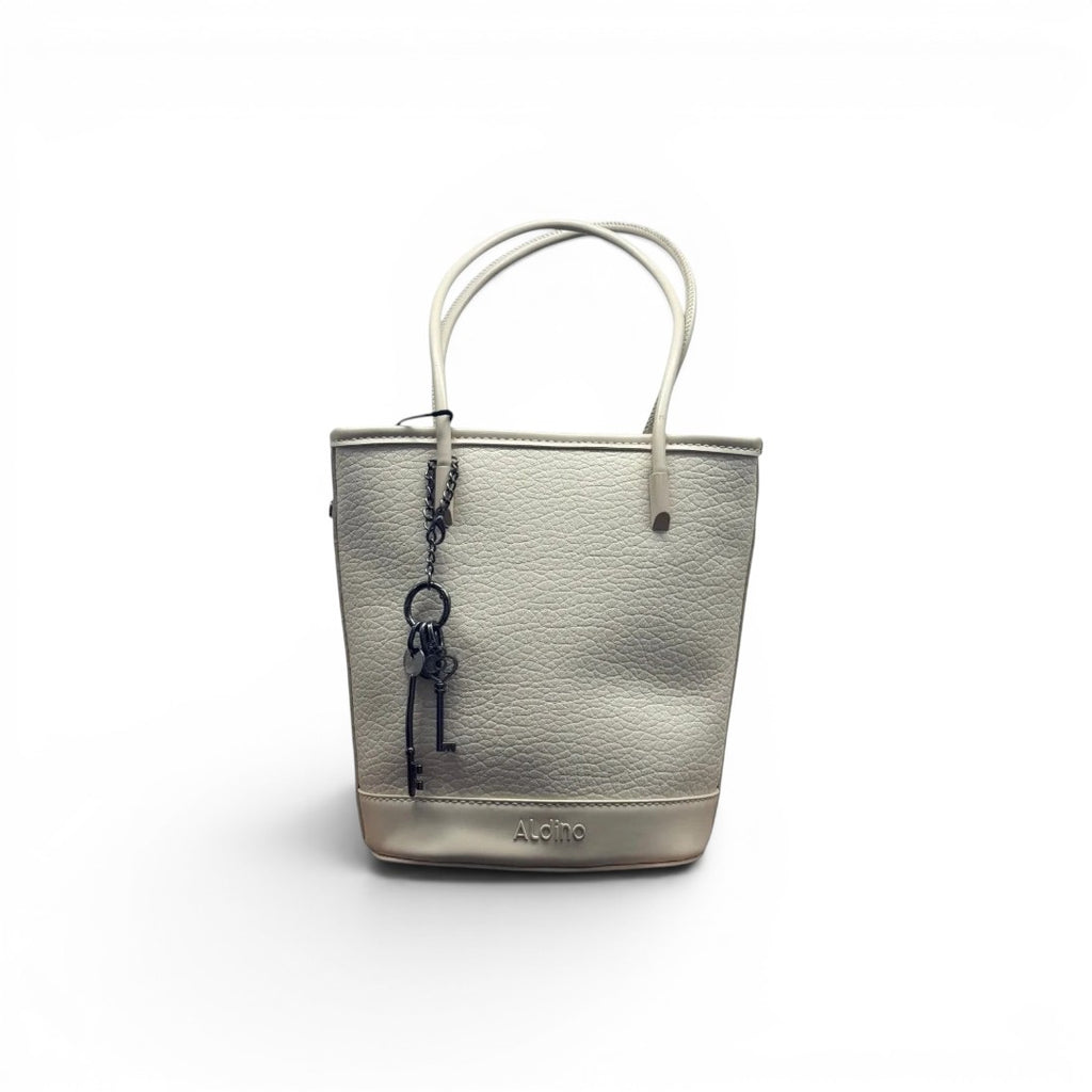 COC Store light grey textured faux leather bucket tote bag with top handles and decorative key charm.