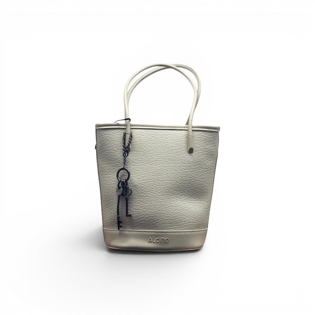 COC Store light grey textured faux leather bucket tote bag with top handles and decorative key charm.
