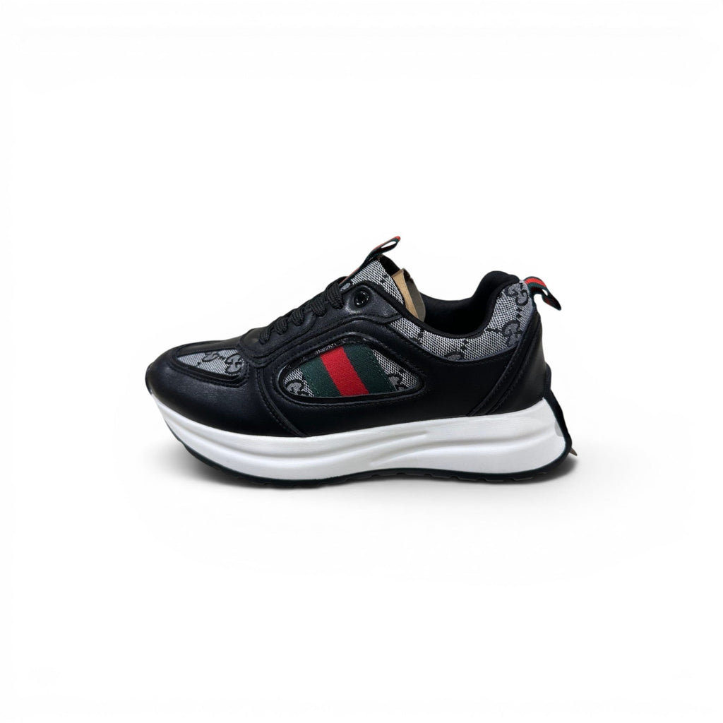 COC Store black leather sneakers with retro green and red stripe detail.