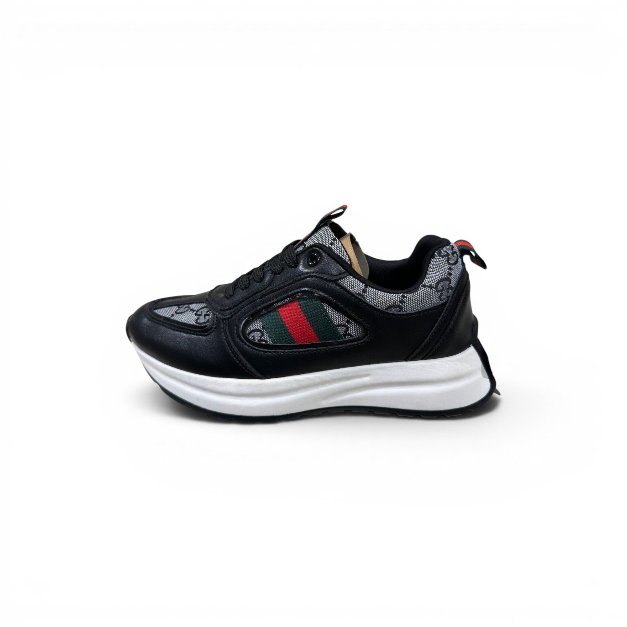 COC Store Gucci Tennis 1977 black leather sneakers with signature green and red stripe detail and logo pattern.