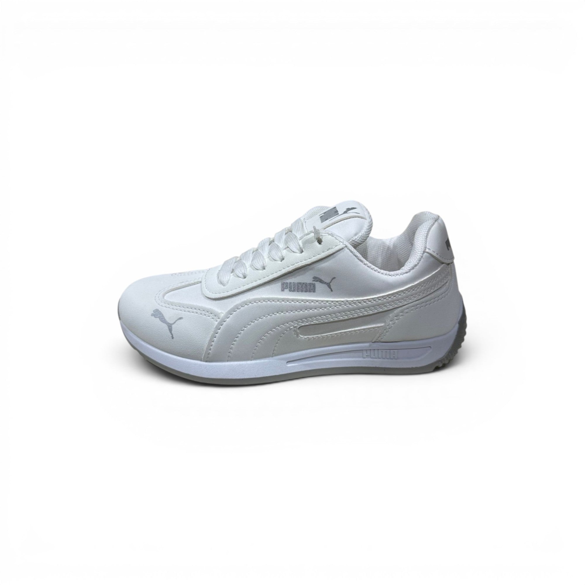 COC Store Puma white leather casual sneakers with cushioned sole and sleek silhouette.