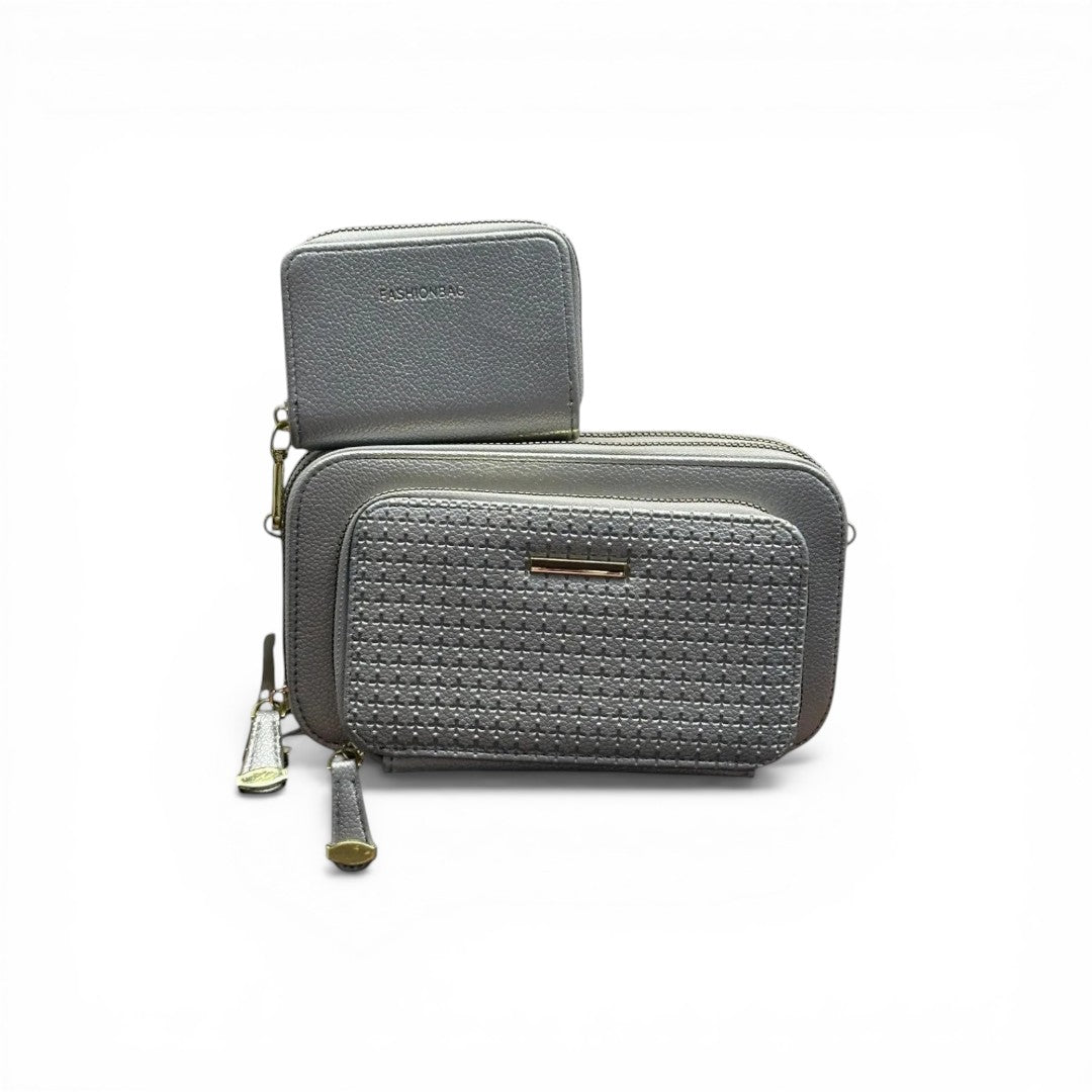 COC Store silver faux leather crossbody bag with matching wallet, featuring woven front pocket and gold-tone hardware.