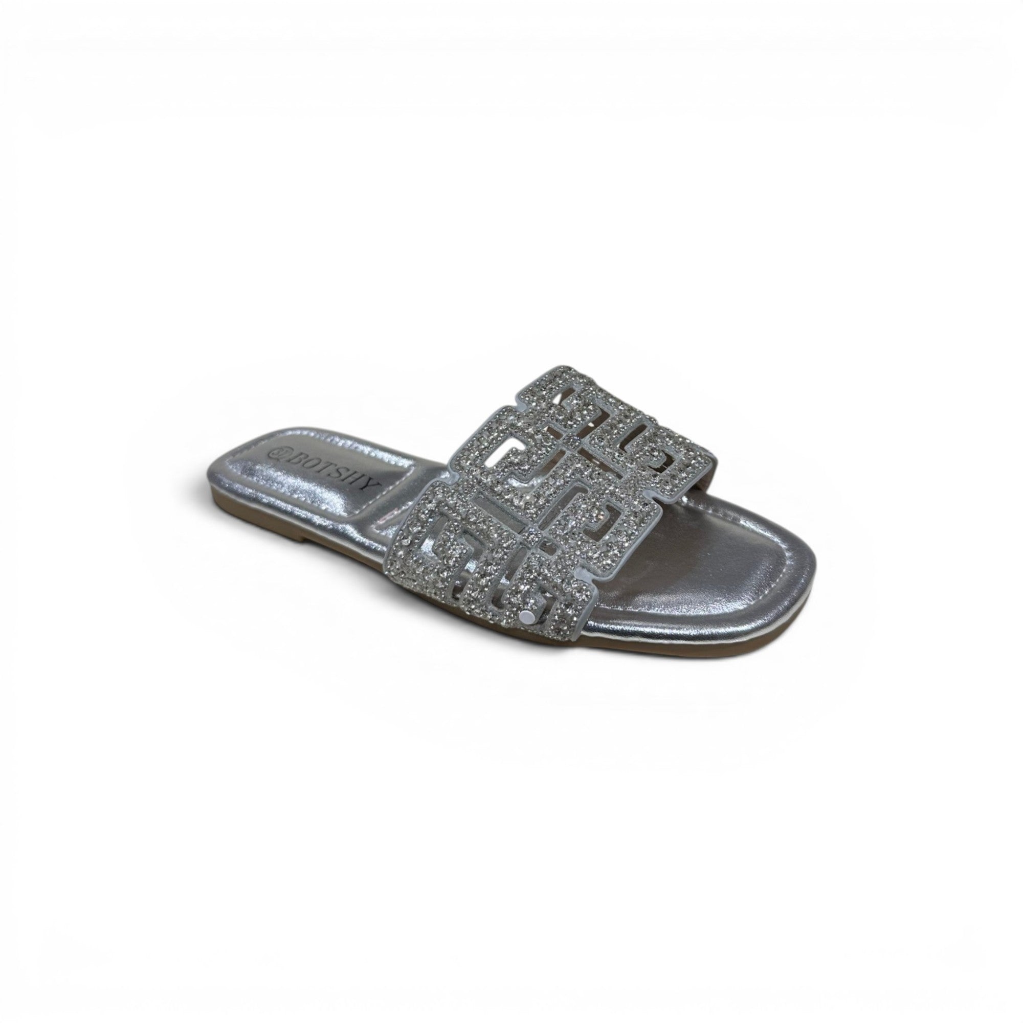 COC Store silver embellished slide sandals with geometric strap and rhinestones.