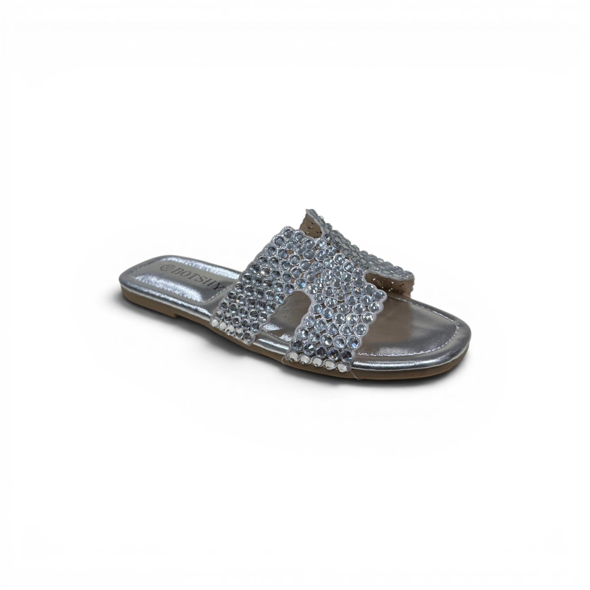COC Store silver embellished slide sandals with H-shaped strap and rhinestones.