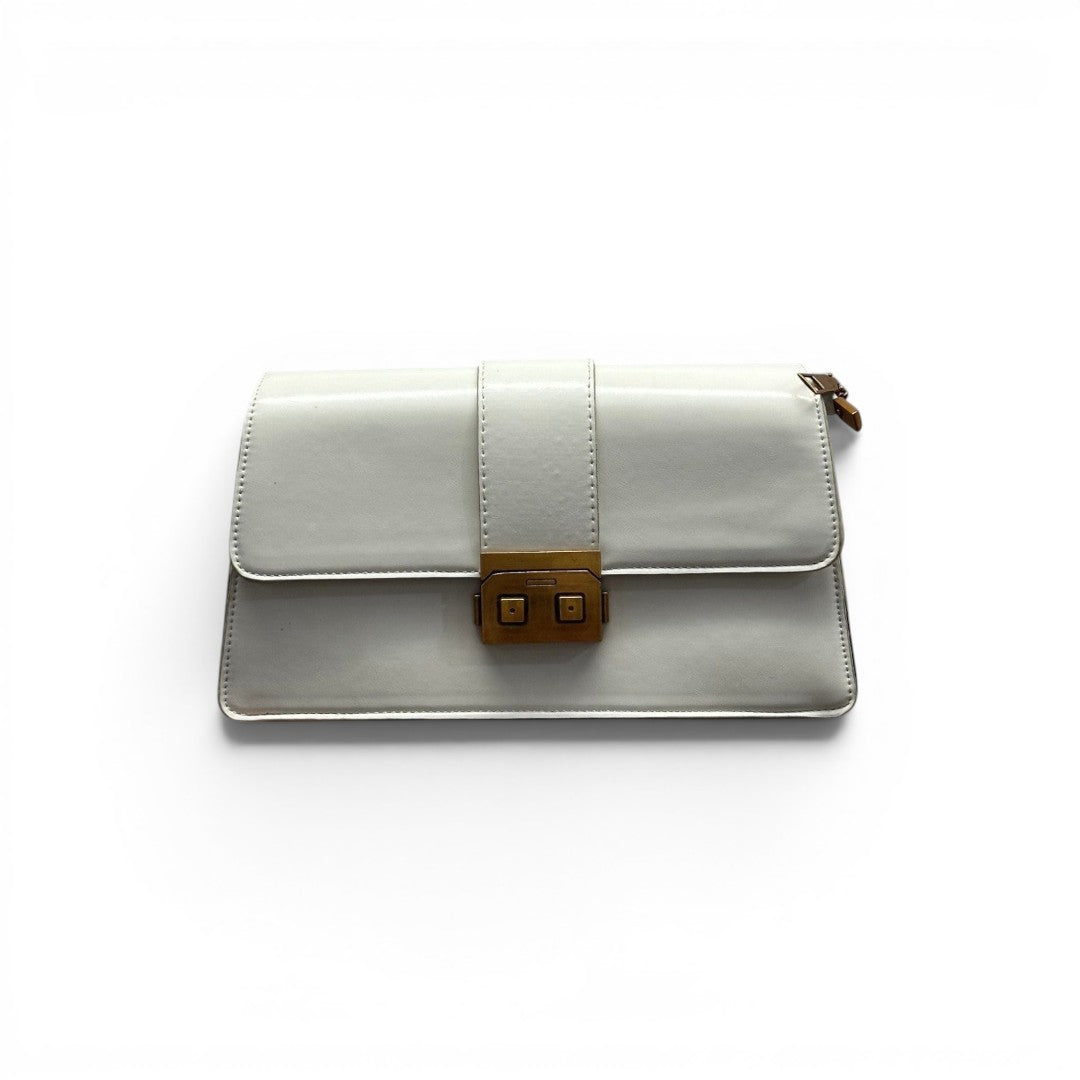 COC Store white faux leather clutch bag with gold-tone clasp closure and structured shoulder strap detail.