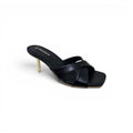 COC Store black heeled mule sandal with criss-cross straps and square toe.