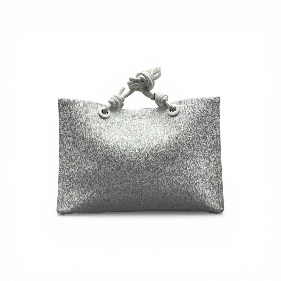 COC Store white textured faux leather tote bag with knotted rope handles. Ideal for everyday use.